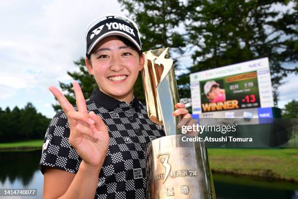 Chisato Iwai of Japan poses with the trophy after winning the tournament following the final round of NEC Karuizawa 72 Golf Tournament at Karuizawa...