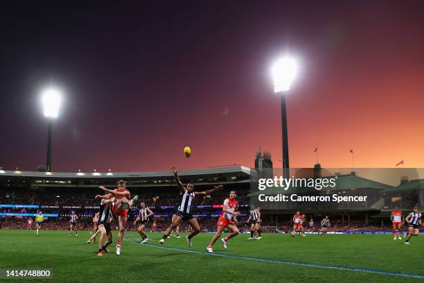 Luke Parker of the Swans kicks during the round 22 AFL match between the Sydney Swans and the Collingwood Magpies at Sydney Cricket Ground on August...