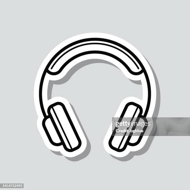 headphones. icon sticker on gray background - dj console stock illustrations