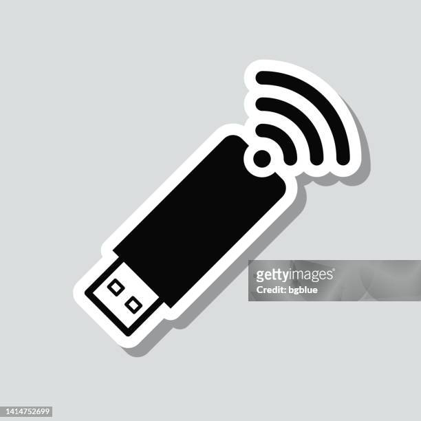 usb-wireless-adapter. symbolaufkleber auf grauem hintergrund - modem stock-grafiken, -clipart, -cartoons und -symbole
