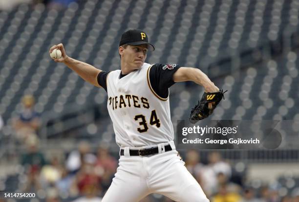 Pitcher Kris Benson of the Pittsburgh Pirates pitches against the San Diego Padres during a Major League Baseball game at PNC Park on May 19, 2004 in...