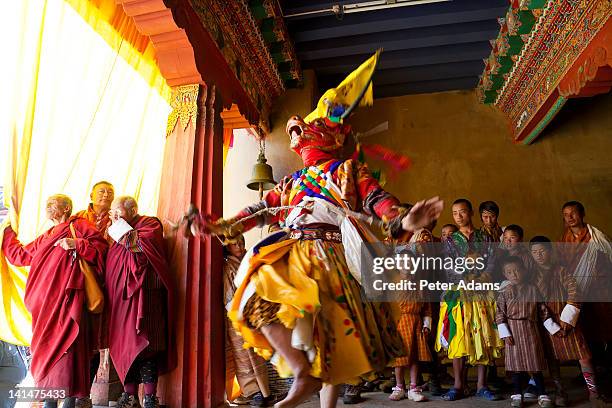 masked festival dancer, gangtey monastery, bhutan - bhutan monks stock pictures, royalty-free photos & images