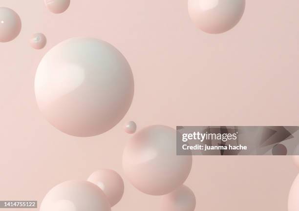a 3d render of abstract bubbles with pink pastel color background - einfarbig stock-fotos und bilder