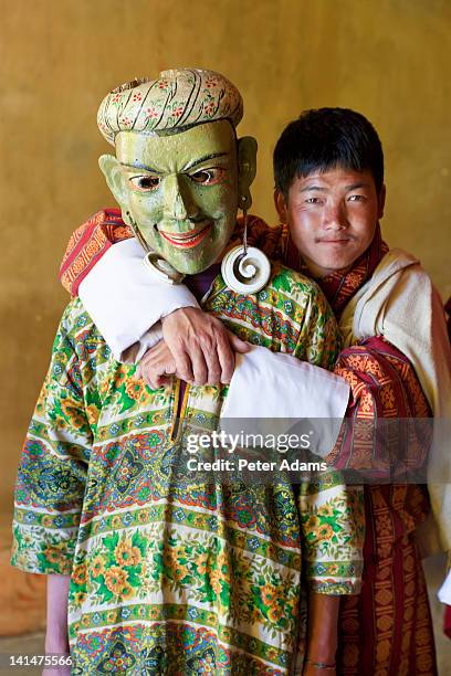 masked dancers, gangtey monastery, bhutan - east bhutan stock pictures, royalty-free photos & images