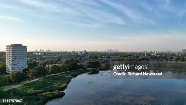 woodberry wetlands and canary wharf - aerial view clouds stock pictures, royalty-free photos & images