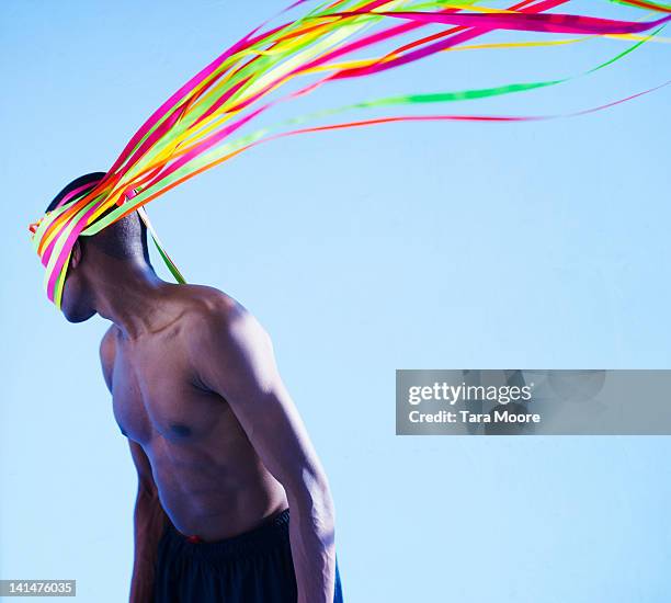 man with colored ribbons attached to head - colorful ribbons stock pictures, royalty-free photos & images