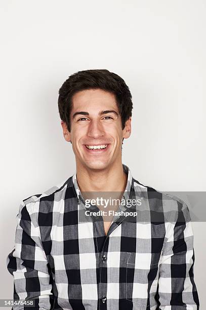 portrait of man smiling - checked shirt stock pictures, royalty-free photos & images