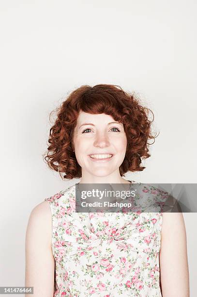 portrait of woman smiling - wavy brown hair stock pictures, royalty-free photos & images