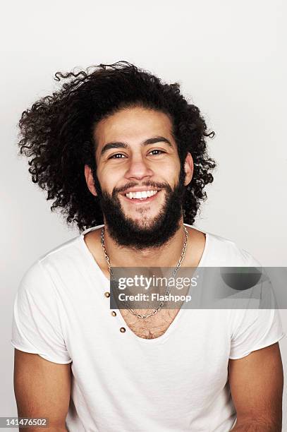 portrait of man smiling - v neck stock-fotos und bilder