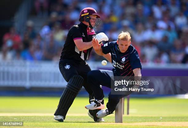 James Rew of Somerset collides with Max Harris of Middlesex during the Royal London One Day Cup match between Somerset and Middlesex at The Cooper...