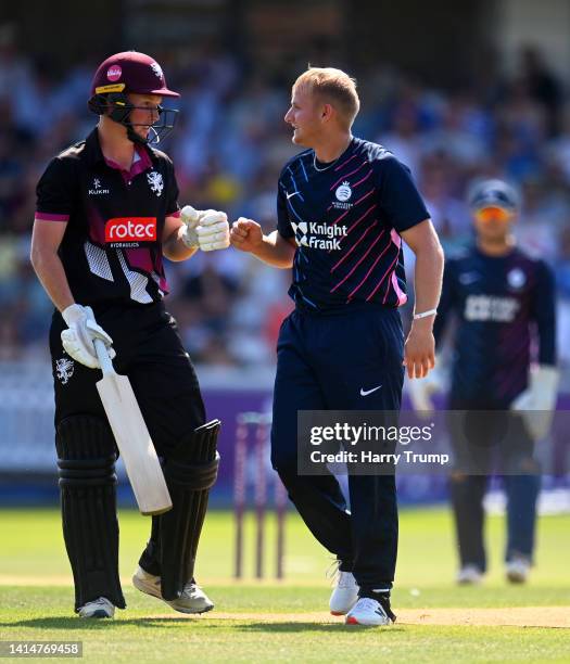 James Rew of Somerset and Max Harris of Middlesex interact after colliding during the Royal London One Day Cup match between Somerset and Middlesex...