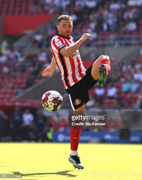 Corry Evans of Sunderland in action during the Sky Bet Championship between Sunderland and Queens Park Rangers at Stadium of Light on August 13, 2022...