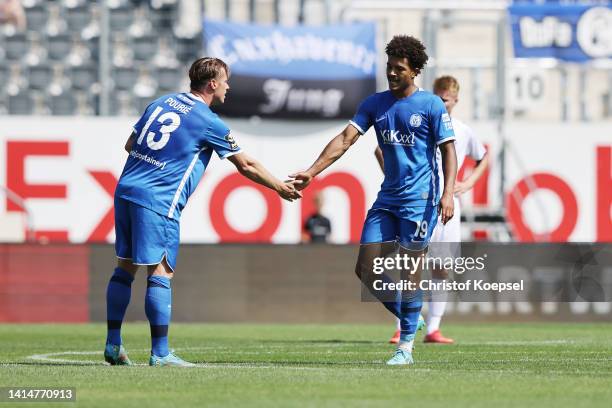 Samuel Abifade of Meppen celebrates with Marvin Pourie of Meppen after scoring his team's first goal during the 3. Liga match between SV Meppen and...