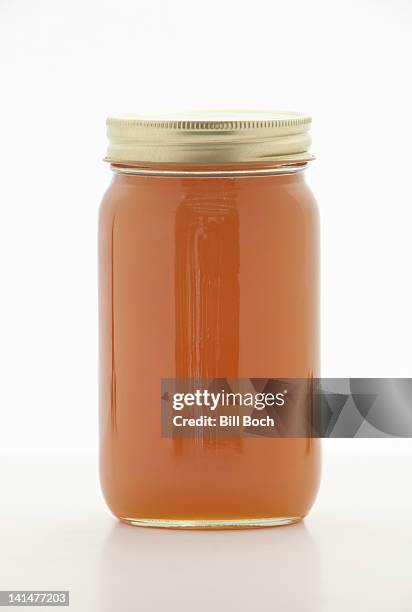 brown rice syrup in a jar - syrup stock pictures, royalty-free photos & images