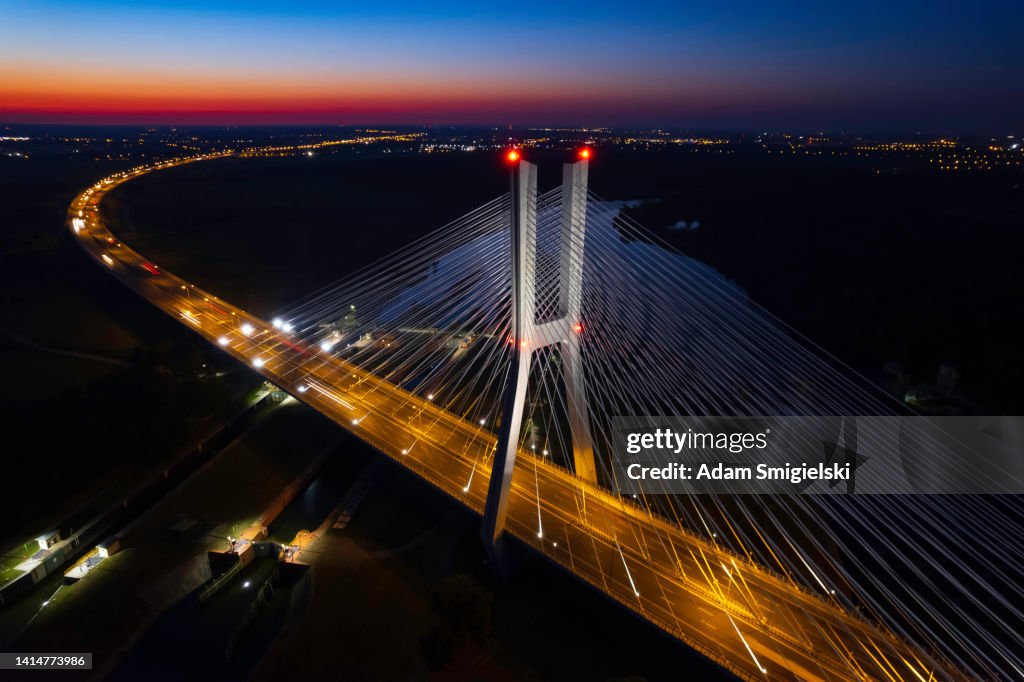 Highway with the bridge at night (aerial)