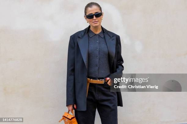 Darja Barannik seen wearing black blazer, button up shirt, denim jeans, brown belt, Hermes bag outside Mark Kenly Domino Tan during Copenhagen...