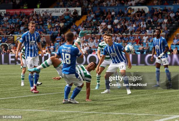 Giorgos giakoumakis of Celtic scores his team's fifth goal during the Cinch Scottish Premiership match between Kilmarnock FC and Celtic FC at on...
