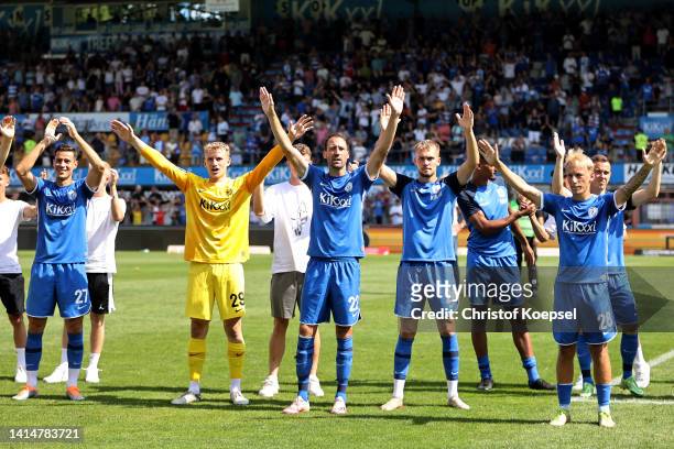 The team of Meppen celebrate following their sides victory in the 3. Liga match between SV Meppen and SV Waldhof Mannheim at Haensch-Arena on August...