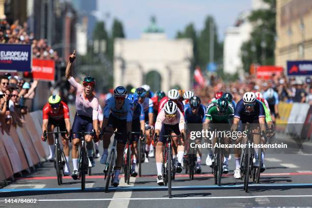 Fabio Jakobsen of Netherlands crosses the finish line to win Gold in the Men's Road Race competition on day 4 of the European Championships Munich...