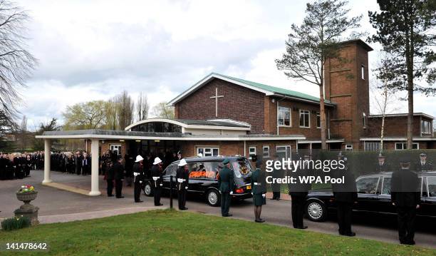 The coffin of Pc David Rathband arrives for his funeral at Stafford Crematorium on March 17, 2012 in Stafford, England. PC Rathband who was shot and...