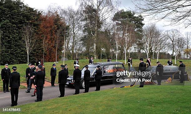 The coffin of Pc David Rathband arrives for his funeral at Stafford Crematorium on March 17, 2012 in Stafford, England. PC Rathband who was shot and...