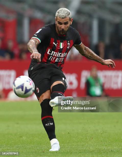 Theo Hernandez of AC Milan kicks a ball during the Serie A match between AC MIlan and Udinese Calcio at Stadio Giuseppe Meazza on August 13, 2022 in...