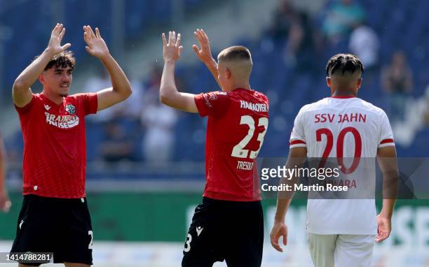 Antonio Foti of Hannover 96 celebrate with team mate Nicolo Tresoldi after the Second Bundesliga match between Hannover 96 and SSV Jahn Regensburg at...