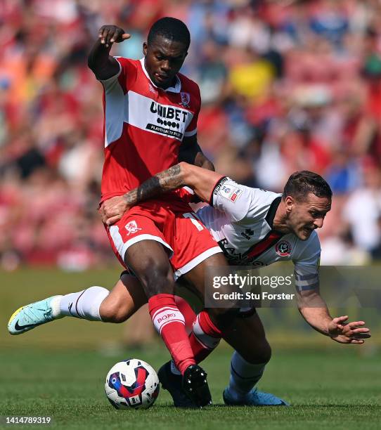 Middlesbrough player Anfernee Dijksteel challenges Billy Sharp of Sheffield United during the Sky Bet Championship between Middlesbrough and...