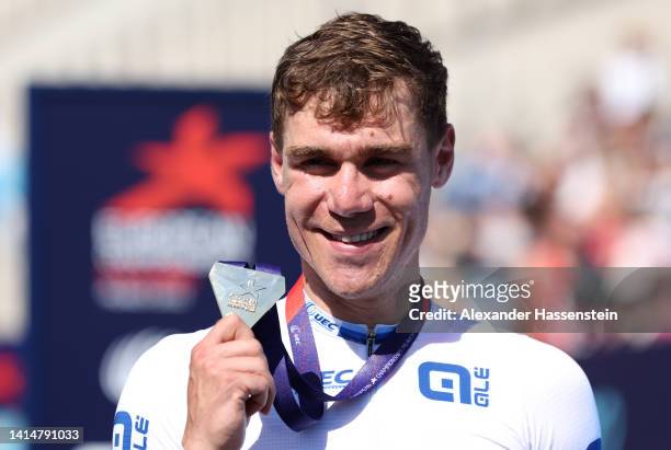 Gold medalist, Fabio Jakobsen of the Netherlands celebrates on the podium after winning the Men's Road Race during the cycling road competition on...