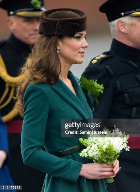 Catherine, Duchess of Cambridge takes part in a St Patrick's Day parade as she visits Aldershot Barracks on St Patrick's Day on March 17, 2012 in...