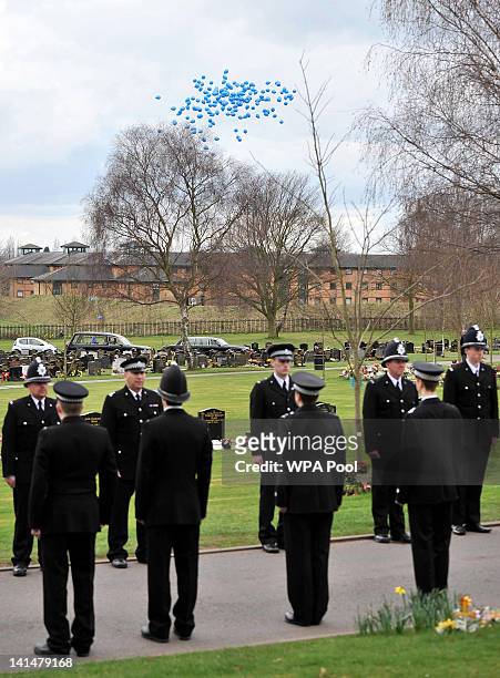 Blue balloons are released after the funeral of Pc David Rathband at Stafford Crematorium on March 17, 2012 in Stafford, England. PC Rathband who was...