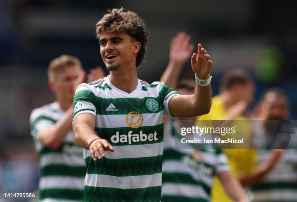Joao Neves Filipe Jota of Celtic celebrates at the end of the game during the Cinch Scottish Premiership match between Kilmarnock FC and Celtic FC at...