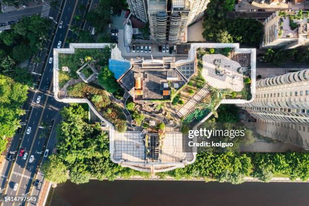 aerial photography of the roof garden of the building - dachterasse stock-fotos und bilder