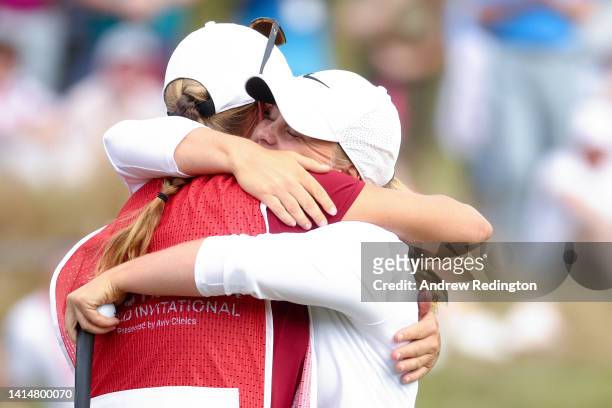 Maja Stark of Sweden celebrates with their caddy after successfully putting on the 18th hole to win the ISPS Handa World Invitational on Day Four of...