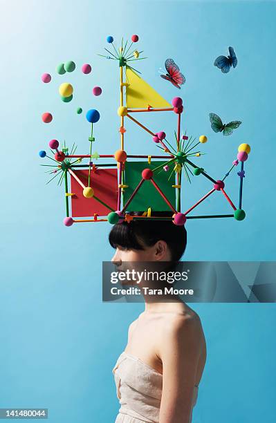 woman with colorful headpiece with balls - portare sulla testa foto e immagini stock