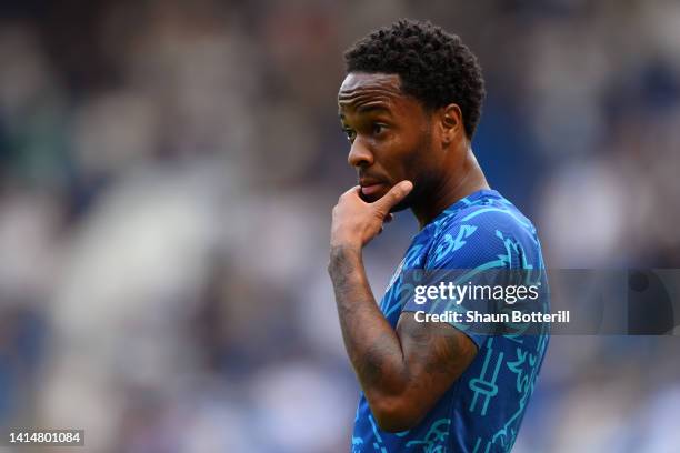 Raheem Sterling of Chelsea reacts while warming up prior to the Premier League match between Chelsea FC and Tottenham Hotspur at Stamford Bridge on...