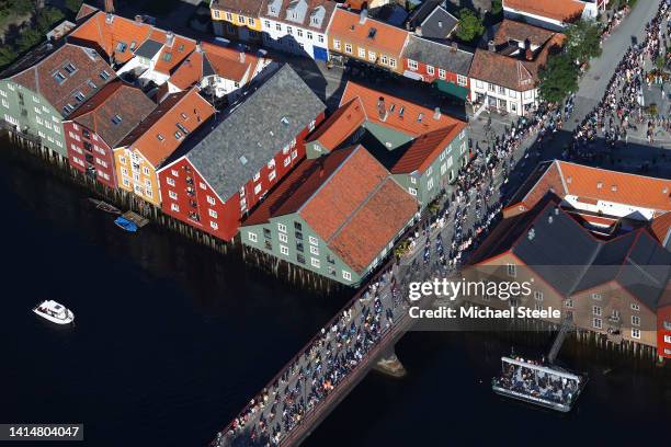 General aerial view of the peloton passing through a bridge at Trondheim City during the 9th Arctic Race Of Norway 2022 - Stage 4 a 159,1km stage...