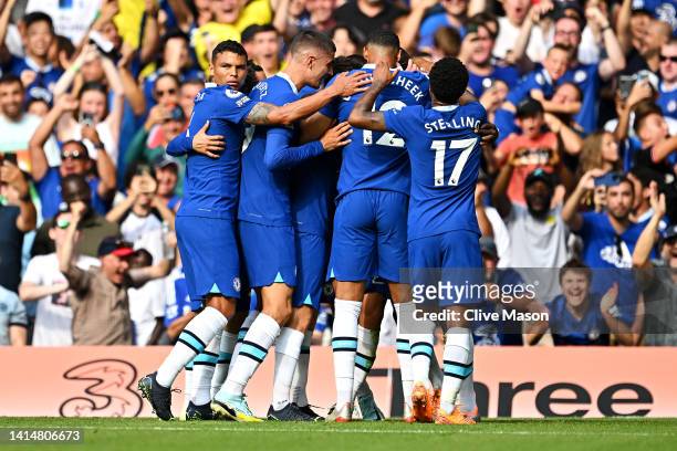 Kalidou Koulibaly of Chelsea celebrates with team mates after scoring their sides first goal during the Premier League match between Chelsea FC and...