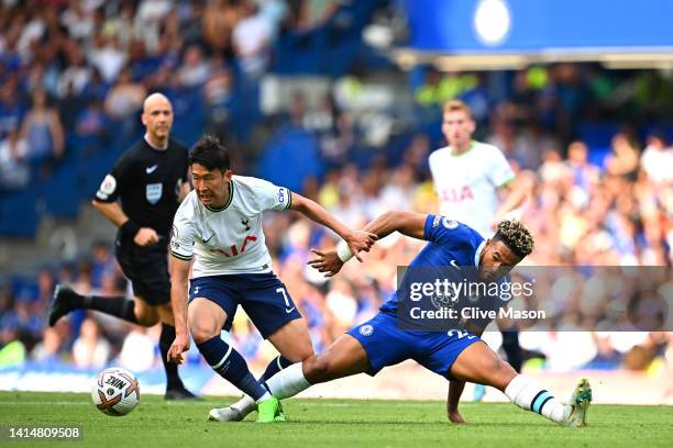 Son Heung-Min of Tottenham Hotspur is challenged by Reece James of Chelsea during the Premier League match between Chelsea FC and Tottenham Hotspur...