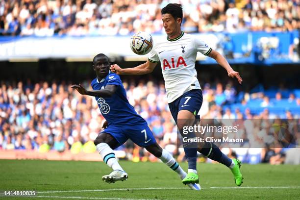 Son Heung-Min of Tottenham Hotspur controls the ball whilst under pressure from Ngolo Kante of Chelsea during the Premier League match between...