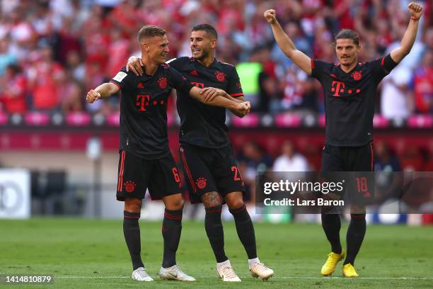 Joshua Kimmich, Lucas Hernandez and Marcel Sabitzer of Bayern Munich celebrate their sides second goal scored by Thomas Muller of Bayern Munich...