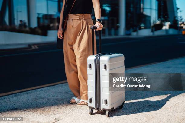 young woman ready to go on vacations - luggage trolley stock pictures, royalty-free photos & images