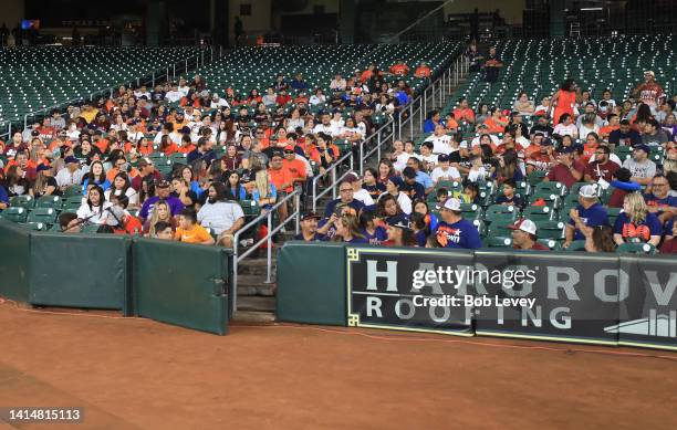 Members of the community of Uvalde, TX, attend the game for Uvalde Strong Day as the Houston Astros host Uvalde Strong Day before the game against...