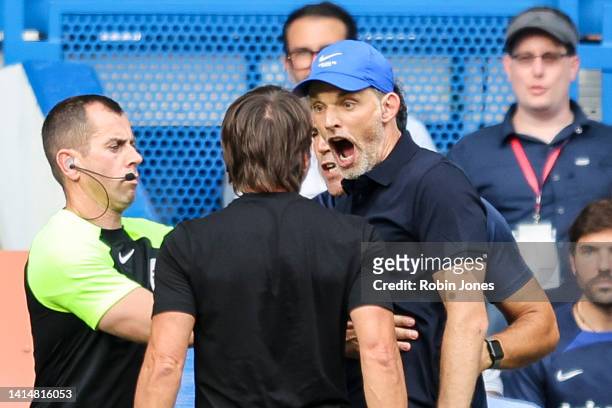 Head Coachs' Antonio Conte of Tottenham Hotspur and Thomas Tuchel of Chelsea square up to each other after Pierre-Emile Hojbjerg of Tottenham Hotspur...