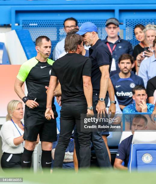 Head Coachs' Antonio Conte of Tottenham Hotspur and Thomas Tuchel of Chelsea square up to each other after Pierre-Emile Hojbjerg of Tottenham Hotspur...