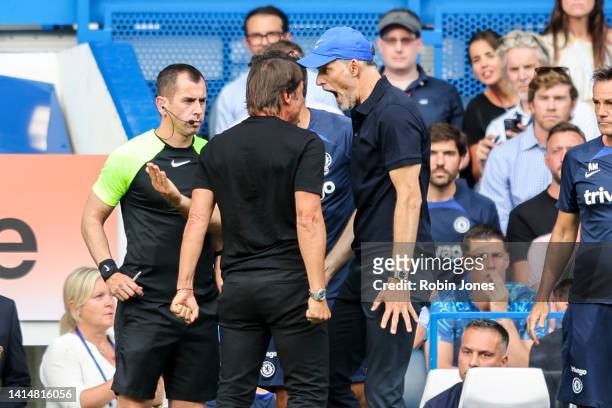 Head Coachs' Antonio Conte of Tottenham Hotspur and Thomas Tuchel of Chelsea square up to each other after Pierre-Emile Hojbjerg of Tottenham Hotspur...