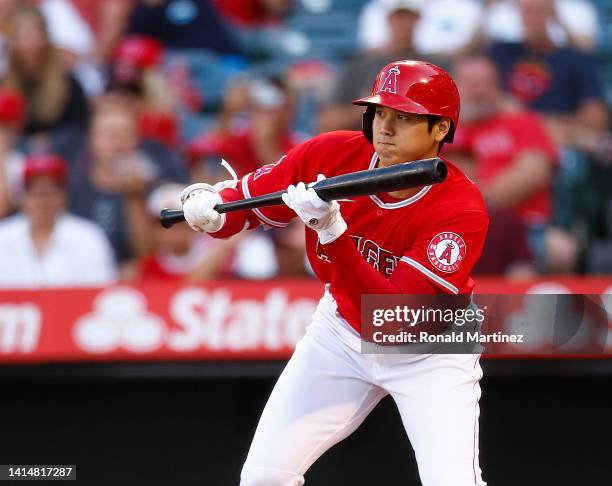 Shohei Ohtani of the Los Angeles Angels grounds out on a bunt against the Minnesota Twins in the first inning at Angel Stadium of Anaheim on August...