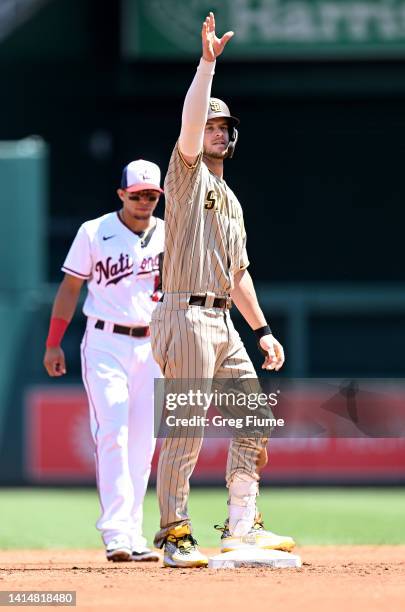 Wil Myers of the San Diego Padres celebrates after driving in a run with a double in the second inning against the Washington Nationals at Nationals...