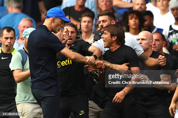 Chelsea manager Thomas Tuchel clashes with Tottenham Hotspur manager Antonio Conte at full-time following the Premier League match between Chelsea FC...