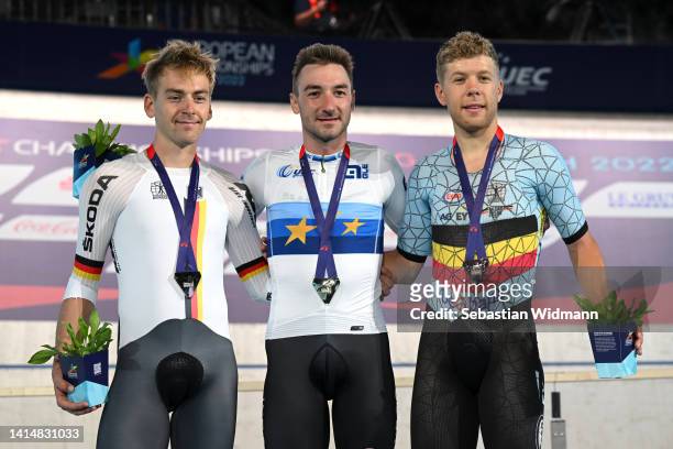 Gold medalist, Elia Viviani of Italy, silver medalist, Theo Reinhardt of Germany and bronze medalist, Jules Hesters of Belgium pose with their medals...